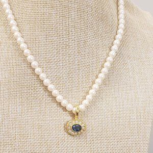 Avon, Vintage faux pearl, gold tone with sapphire & jewel pendant necklace